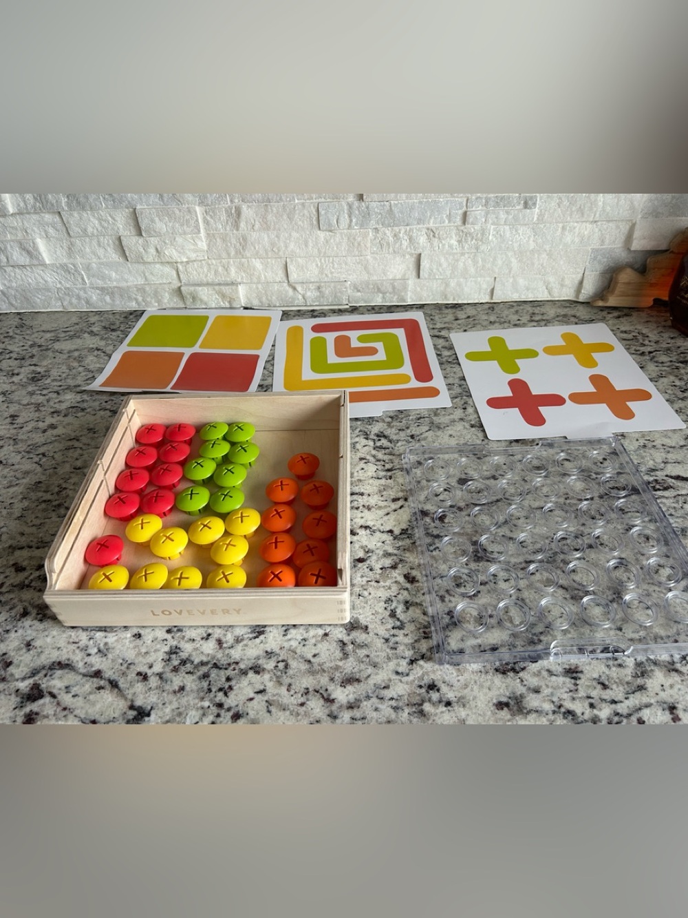 Lovevery Color Sorting Peg Game - Red, Green, Yellow, Orange